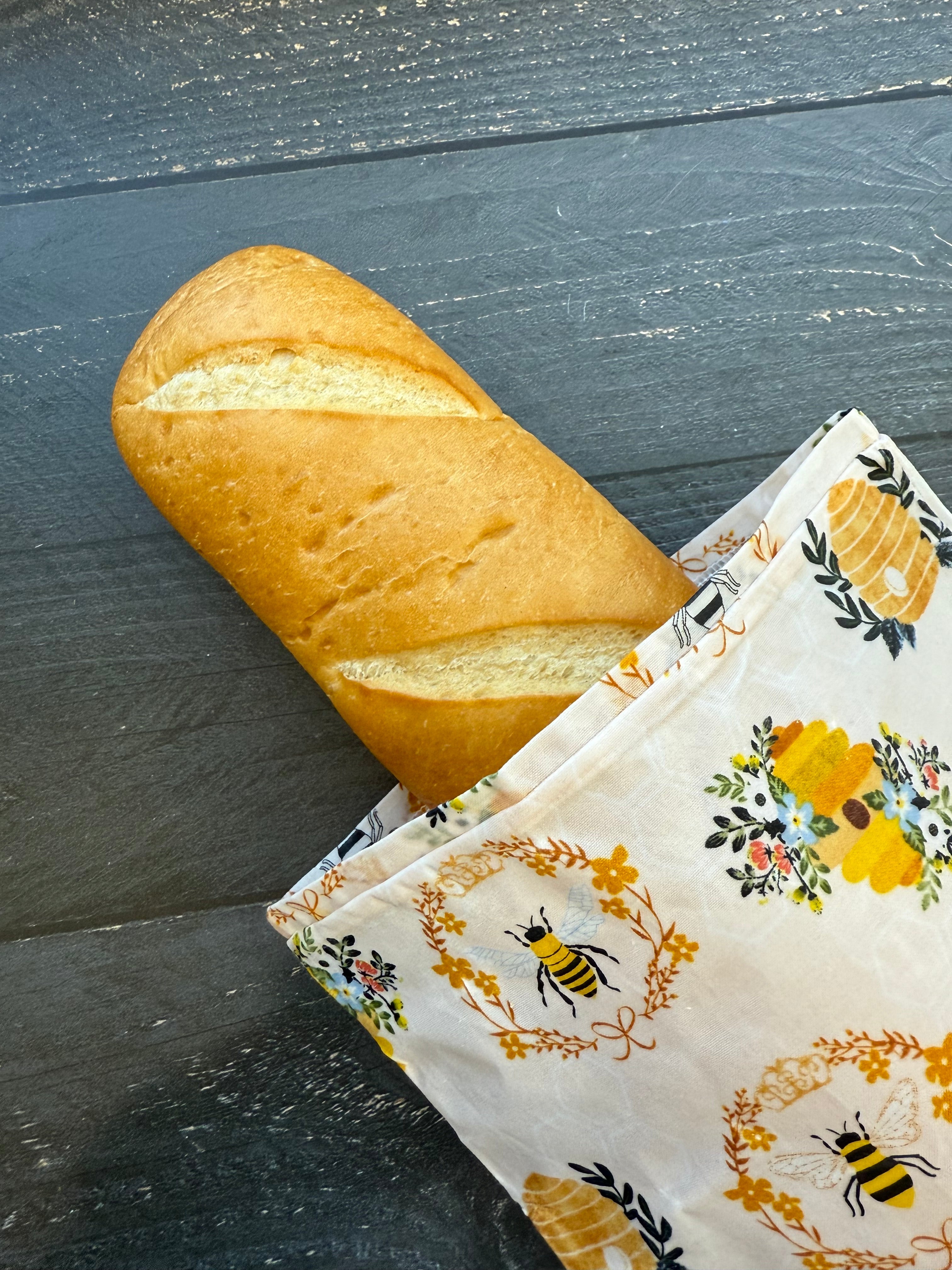 Beeswaxed Baguette bag from Five Oaks Farm featuring floral design, made from natural beeswaxed material, with a rustic farm style.