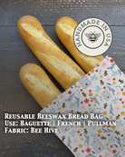 Beeswaxed Baguette bag from Five Oaks Farm with floral design, made from natural beeswaxed fabric, ideal for carrying essentials.