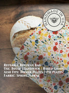 Beeswaxed bread bag from Five Oaks Farm, green fabric with natural beeswax coating, designed for storing bread and baked goods.