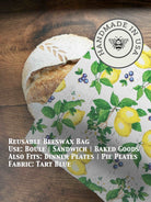 Bee-themed beeswaxed bread bag from Five Oaks Farm, green fabric with natural beeswax coating for fresh bread storage.