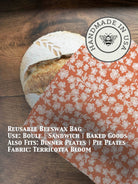 Beeswaxed bread bag from Five Oaks Farm with green fabric and natural beeswax coating for fresh bread storage.