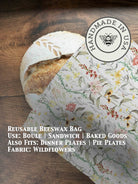 Beeswaxed bread bag from Five Oaks Farm, eco-friendly fabric with green beeswax coating for storing fresh bread.