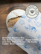 Beeswaxed bread bag from Five Oaks Farm, green fabric with natural beeswax coating, designed for storing and transporting bread.