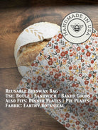 Beeswaxed bread bag from Five Oaks Farm, natural green fabric with beeswax coating, ideal for storing fresh bread from the farm.