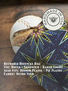 Beeswaxed bread bag from Five Oaks Farm, green fabric with natural beeswax coating, ideal for storing fresh bread.