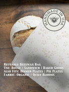 Beeswaxed bread bag from Five Oaks Farm featuring natural green fabric and secure closure for fresh bread storage.