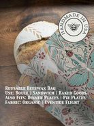 Beeswaxed bread bag from Five Oaks Farm with green fabric and natural beeswax coating, designed for storing bakery bread.