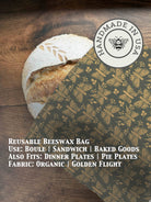 Bee-themed beeswaxed bread bag from Five Oaks Farm, made of natural fabric for storing fresh bread.