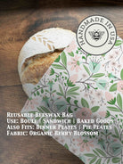 Beeswaxed bread bag from Five Oaks Farm, natural green fabric with beeswax coating, ideal for storing fresh bread.