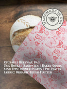 Beeswaxed bread bag from Five Oaks Farm, green fabric with natural beeswax coating, designed for storing fresh bread.