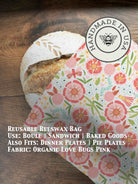 Beeswaxed bread bag from Five Oaks Farm with green fabric, designed for storing fresh bread naturally.