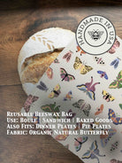 Bee-themed beeswaxed bread bag from Five Oaks Farm, green fabric with natural bees design for fresh bread storage.
