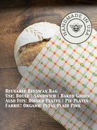 Beeswaxed bread bag from Five Oaks Farm featuring green fabric and natural beeswax coating for fresh bread storage.