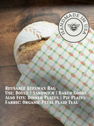 Green beeswaxed bread bag from Five Oaks Farm, natural fabric with beeswax coating for fresh bread storage.