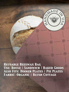Beeswaxed bread bag from Five Oaks Farm with natural green fabric and beeswax coating, designed for storing bread.