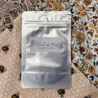 Freeze-dried sourdough starter from Five Oaks Farm's Denali collection, showing the dried starter in a clear jar with farm background.