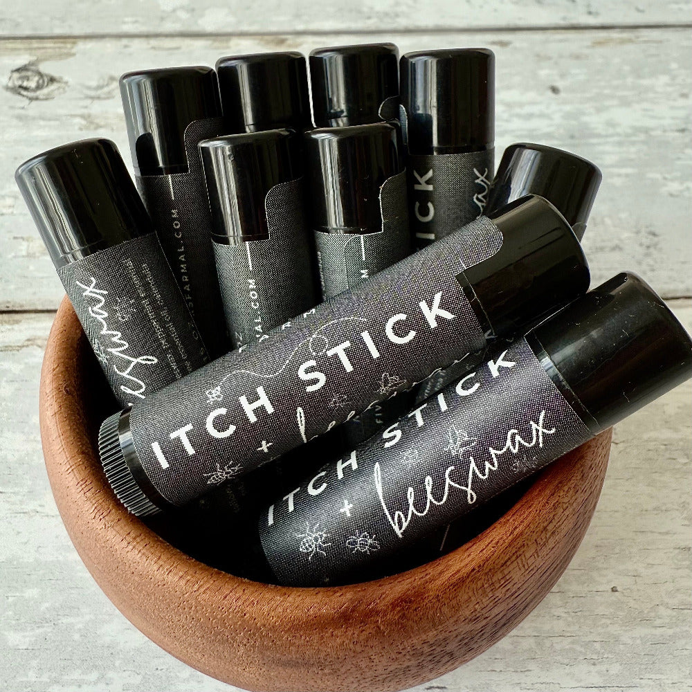 Natural remedy Itch Stick from Five Oaks Farm, with herbal ingredients for soothing skin relief, shown in the image.