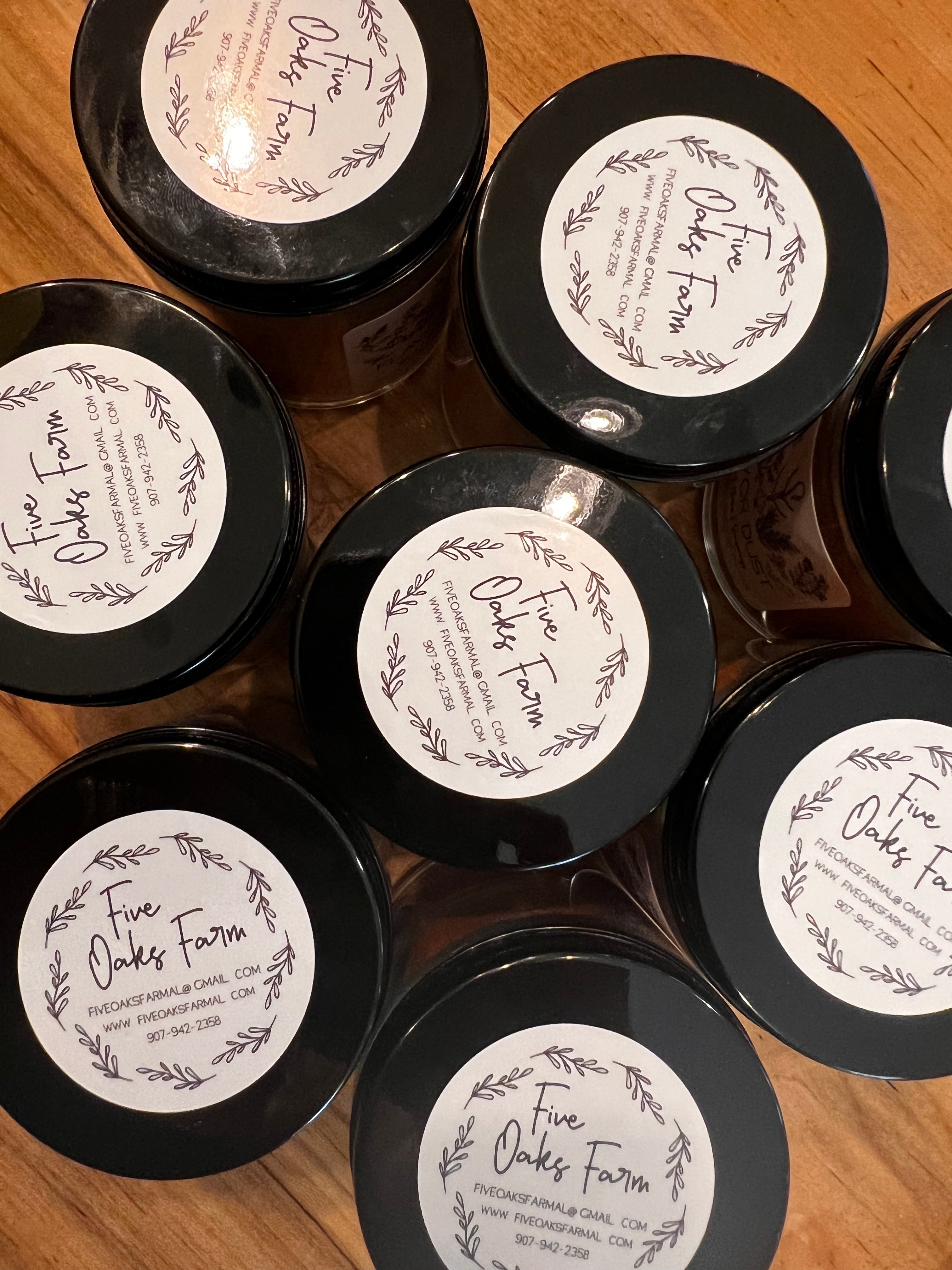 Five Oaks Farm Flavor Dust shaker with natural seasoning blend from the farm, showing the spice in a clear jar.