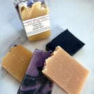 Handmade soap from Five Oaks Farm with lemon and honey scent, featuring a rustic, natural appearance and farm-fresh ingredients.