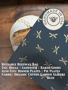Organic cotton bread bag from Five Oaks Farm with beeswax coating, designed for storing fresh bread and maintaining crust.