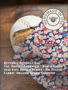 Beeswaxed bread bag from Five Oaks Farm with a vibrant garden design, perfect for storing fresh bread naturally.
