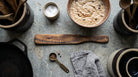 Five Oaks Farm Spurtle from the Farm, wooden kitchen utensil with a smooth handle and rounded end for stirring and mixing.