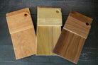 Maple vertical cutting board by Five Oaks Farm with a smooth surface and natural wood grain, ideal for kitchen food prep.