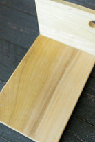 Five Oaks Farm maple vertical cutting board with a smooth, polished surface and natural wood grain finish.