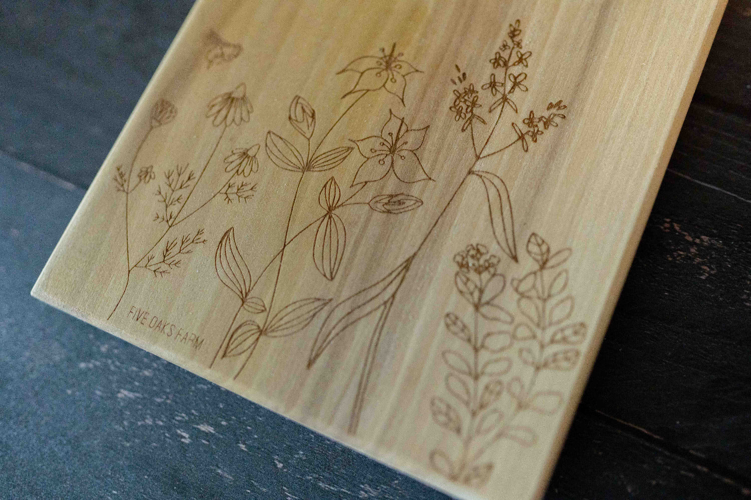 Five Oaks Farm maple vertical cutting board with a smooth surface and natural wood grain, ideal for kitchen prep and serving.