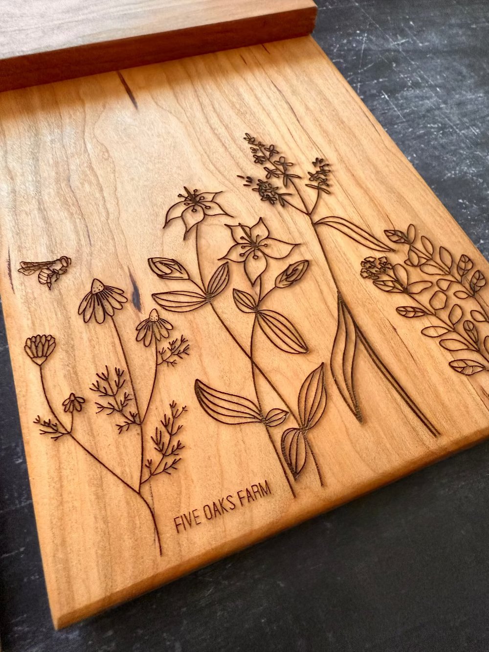 Vertical maple cutting board by Five Oaks Farm, showcasing a smooth surface and sturdy construction for kitchen use.