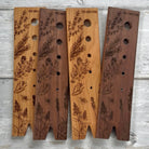Walnut herb stripper from Five Oaks Farm with multiple openings for easily stripping herbs like thyme and rosemary.