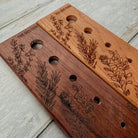 Walnut herb stripper by Five Oaks Farm with wooden handle and stainless steel blades for easy herb removal.