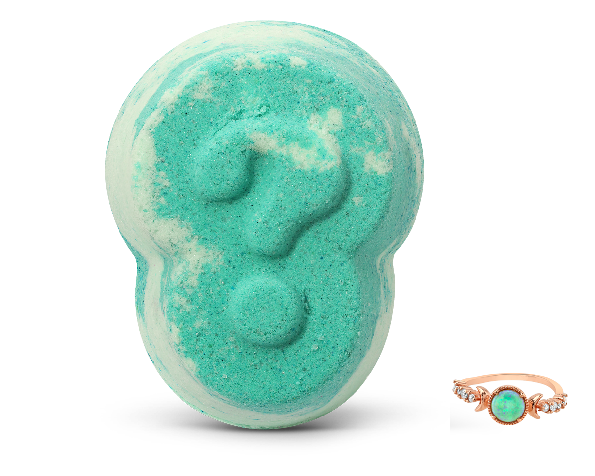 Fragrant Jewels Surprise Bath Bomb with rhodium plating, showcasing vibrant colors and intricate design for a relaxing bath experience.
