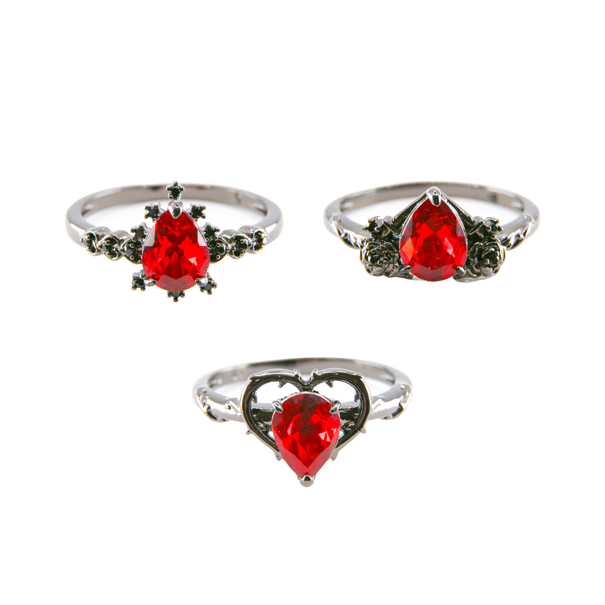 Fragrant Jewels Wicked Love bath bomb with a decorative ring inside, showcasing vibrant colors and fizzing texture.