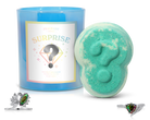 Fragrant Jewels surprise candle and bath bomb bundle with a ring, featuring a rhodium-plated design and vibrant packaging.
