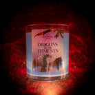 Fire Dragon Jewel Candle by Fragrant Jewels featuring a glass container with a detailed fire dragon design, ringless style.