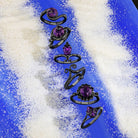 Sea Witch Jewel Candle by Fragrant Jewels in rhodium-plated ceramic pendant, featuring intricate sea-themed design.