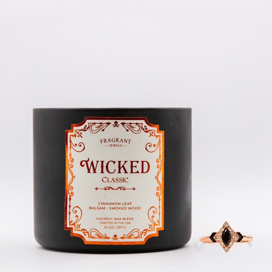 Fragrant Jewels Wicked Classic 2.0 Jewel Candle with a hidden ring inside, featuring a luxurious wax design and elegant packaging.