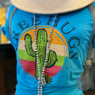 The Graphic Tee free hugs cactus short sleeve crewneck graphic T-shirt showing a playful cactus design on a white fabric background.
