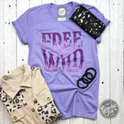 Dark lavender short sleeve crew neck graphic tee by Free + Wild, featuring a relaxed fit and casual style.