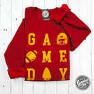 Red and gold KC crewneck sweatshirt from The Graphic Tee featuring a Game Day graphic design, ideal for casual wear.
