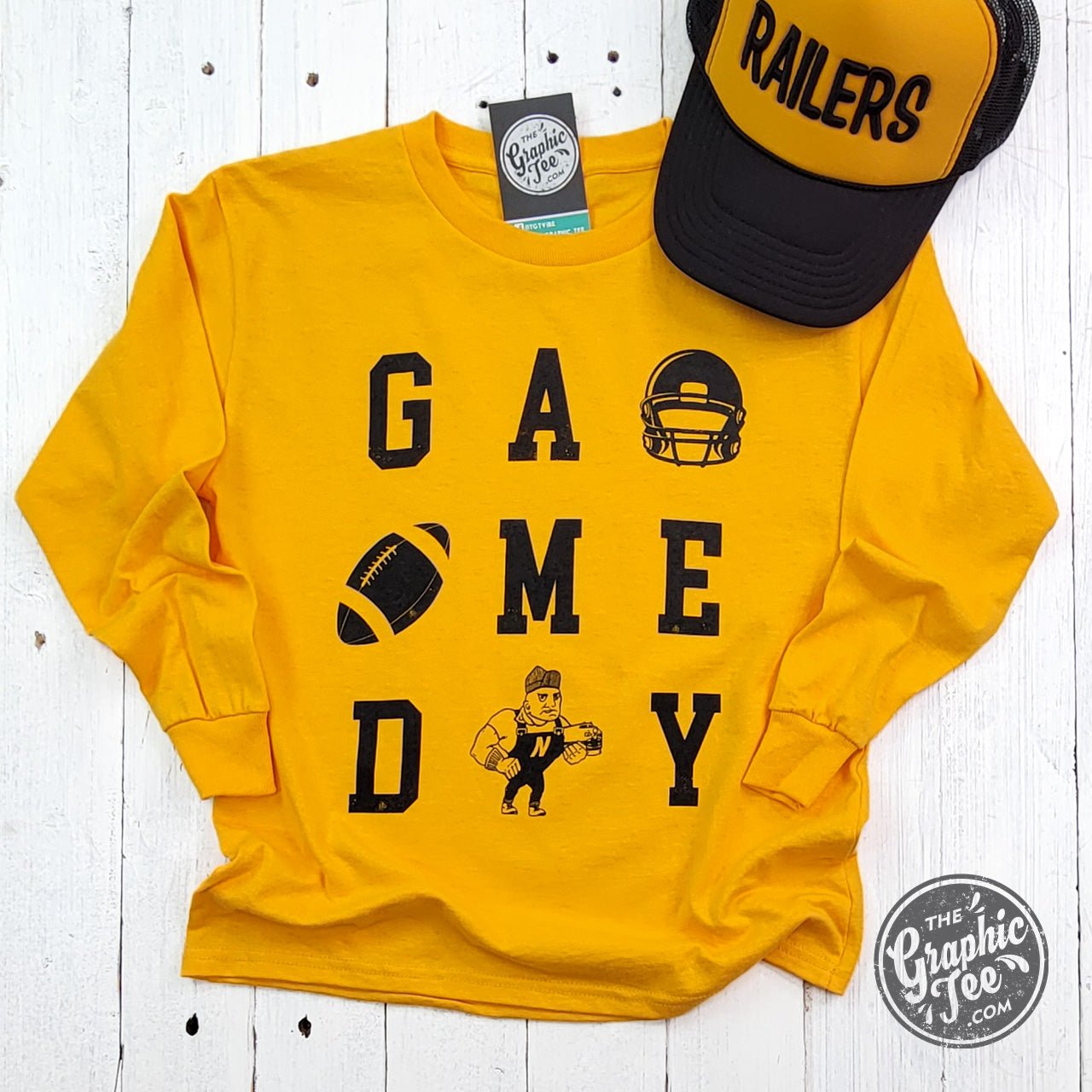 Youth long sleeve gold graphic tee by The Graphic Tee featuring team logo and game day design on soft fabric.
