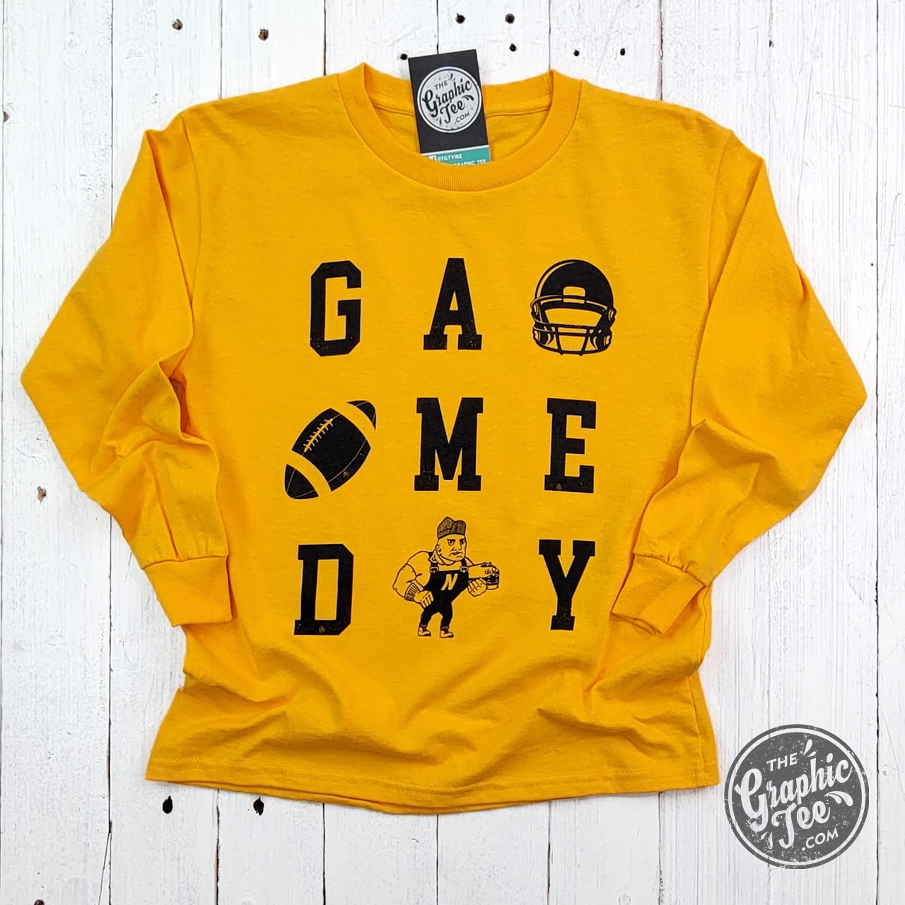 Youth long sleeve gold graphic tee from The Graphic Tee, featuring game day design and casual style.