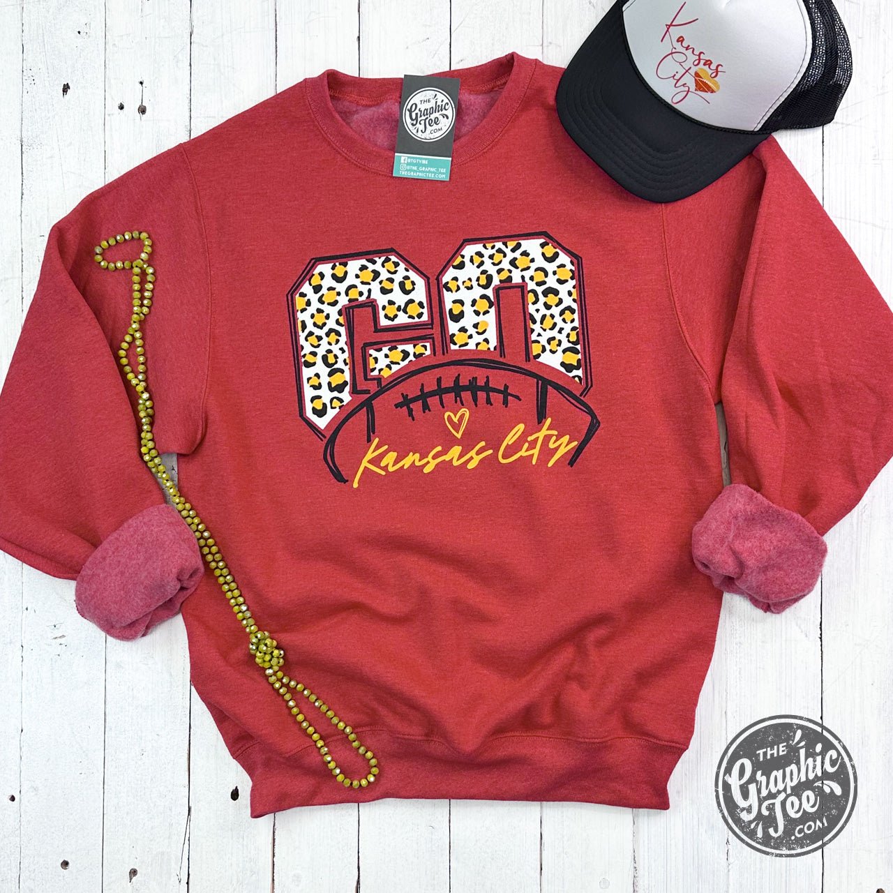 Red leopard print unisex crewneck sweatshirt by The Graphic Tee featuring bold graphic design and comfortable fit.