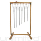 Set of 6 Gongs Unlimited Sacred Solfeggio Tuned Healing Chimes with wooden stand, featuring colorful chime tubes arranged on a stand.