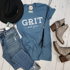 Unisex Grit And Grace Graphic Tee by The Graphic Tee, featuring a stylish design on a short-sleeve casual shirt.
