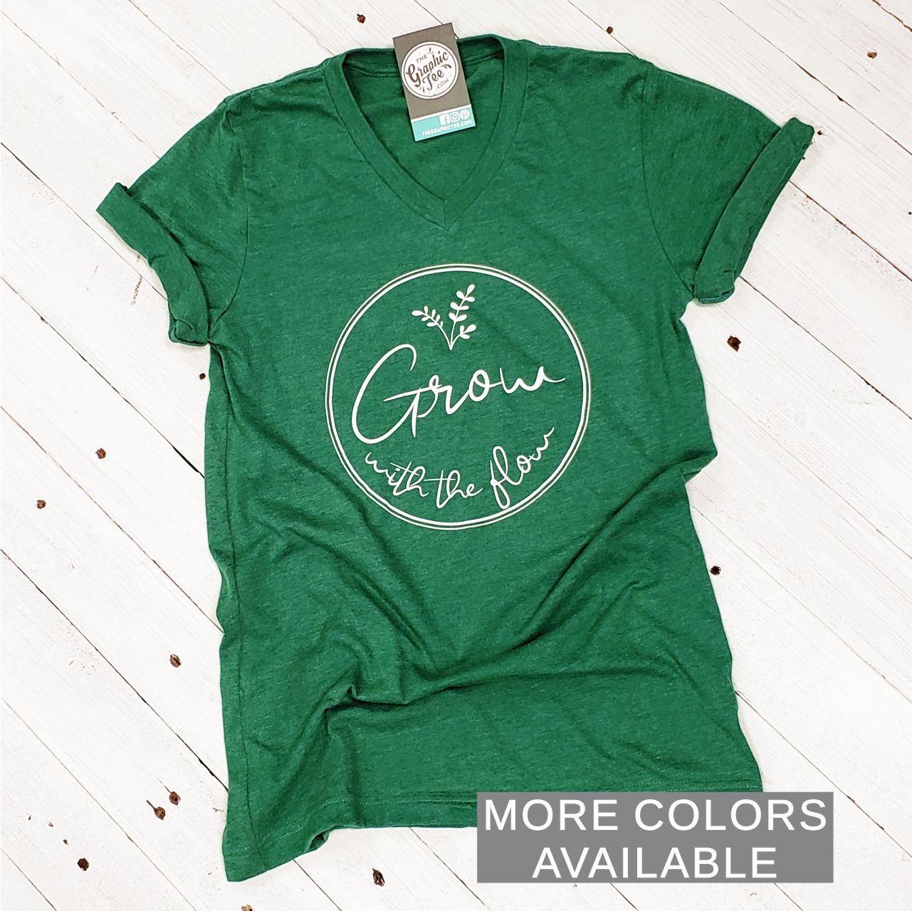 Unisex V-neck graphic tee by The Graphic Tee featuring the "Grow with the Flow" design, casual and comfortable for everyday wear.