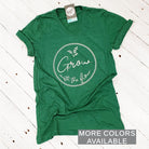 Unisex V-neck graphic tee by The Graphic Tee featuring the "Grow with the Flow" design, casual and comfortable for everyday wear.