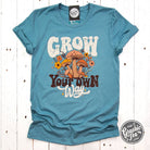 Heather blue lagoon short sleeve graphic tee from The Graphic Tee, featuring a casual, comfortable design with a stylish print.