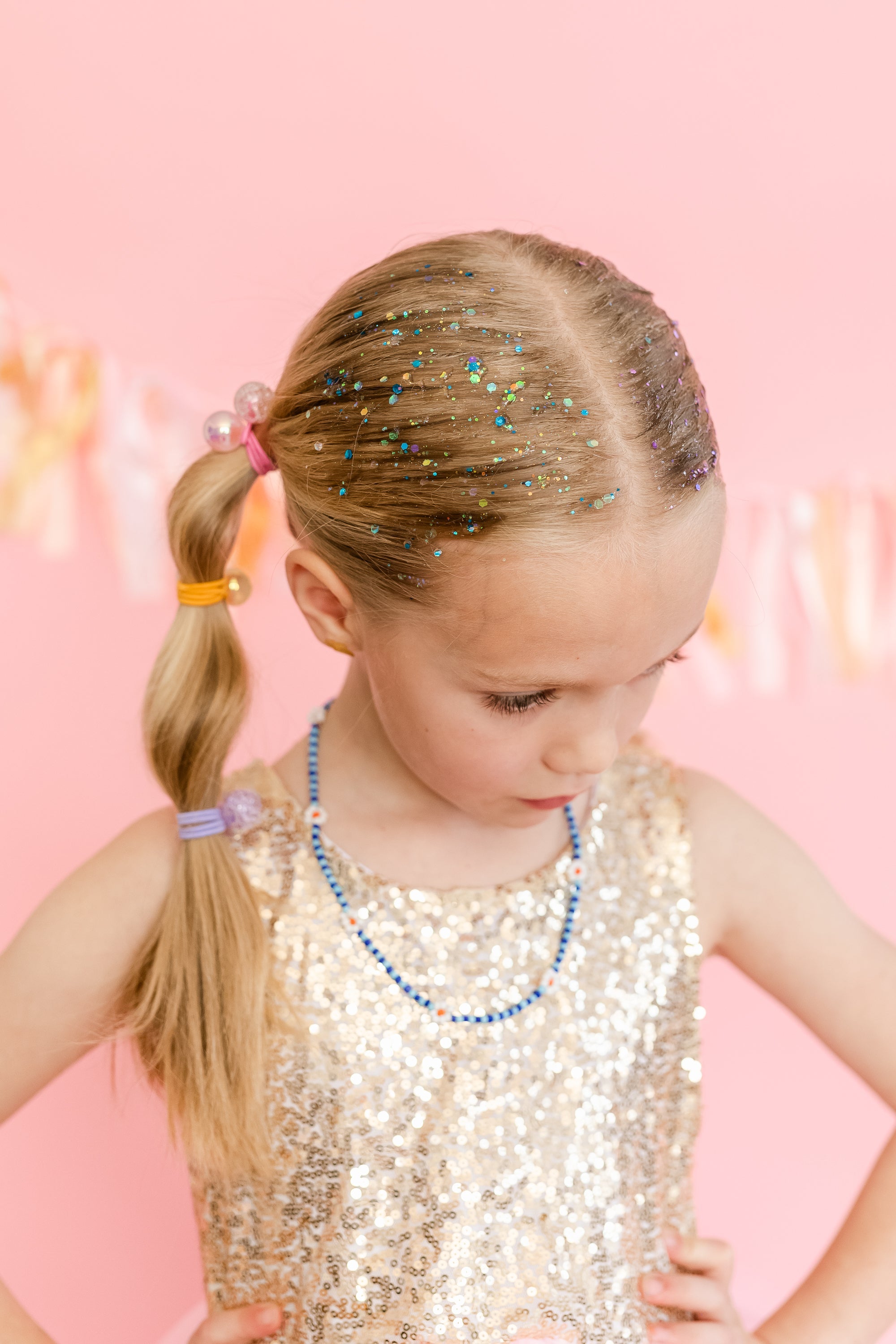 Blue hair glitter headband by Gussy Up Bow Co. with sparkling glitter design, perfect for adding shine to hairstyles.